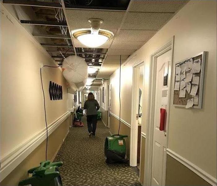 Hallway with water damage.