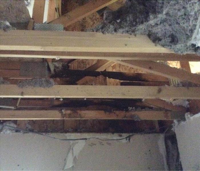 Electrical damage starts fire in ceiling